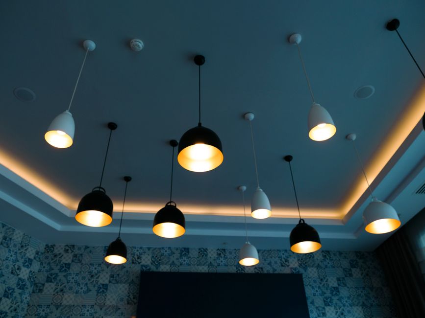 Stylish pendant lamps illuminate a modern interior with a chic, contemporary design.