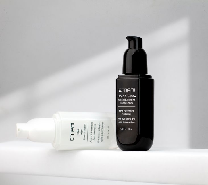 Studio shot of Emani skincare serums on a white background showcasing luxury beauty products.